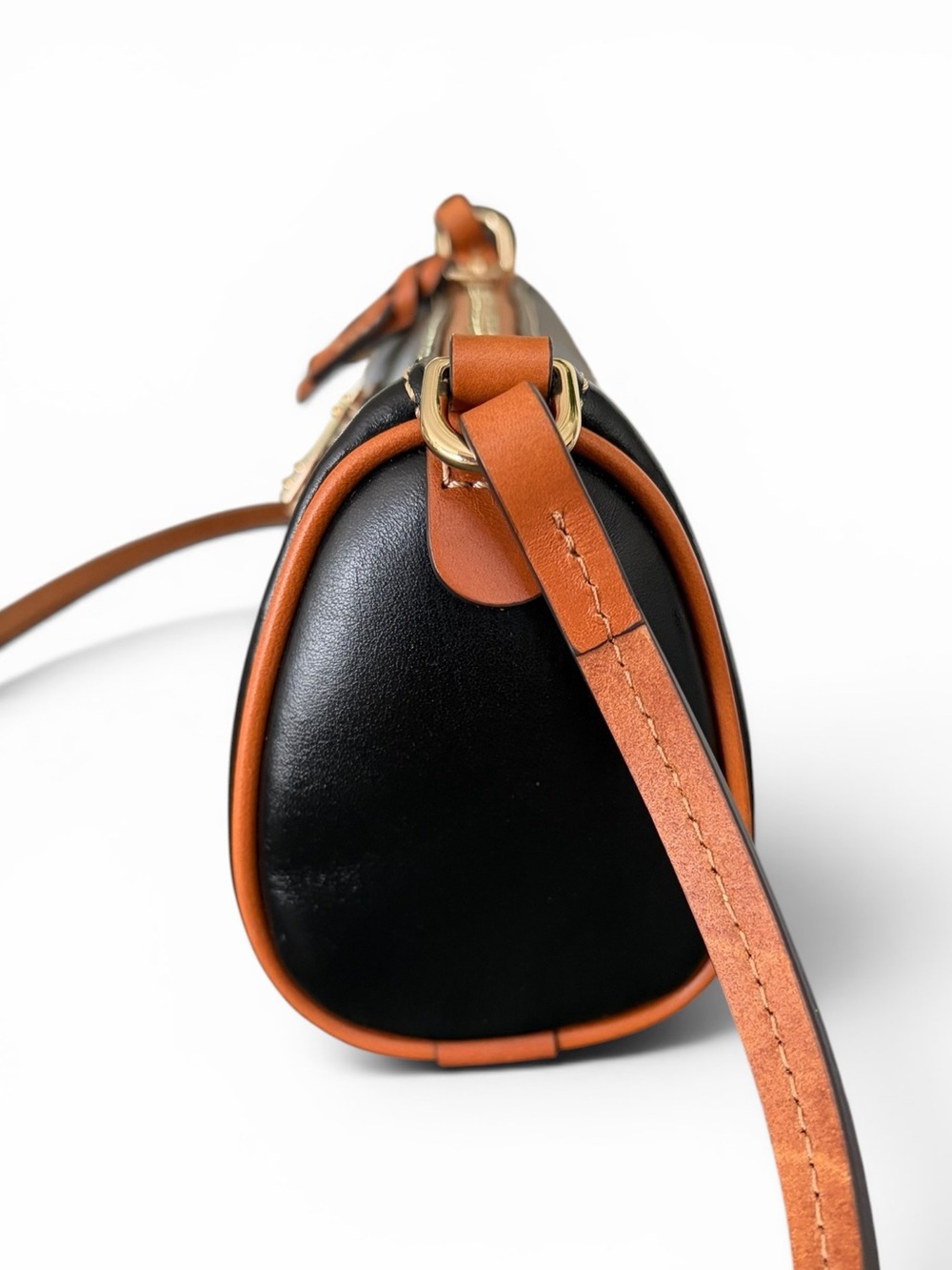 Dooney & Bourke Buffy Crossbody Black with Tan Trim Leather Barrel Crossbody - Picture 7 of 16